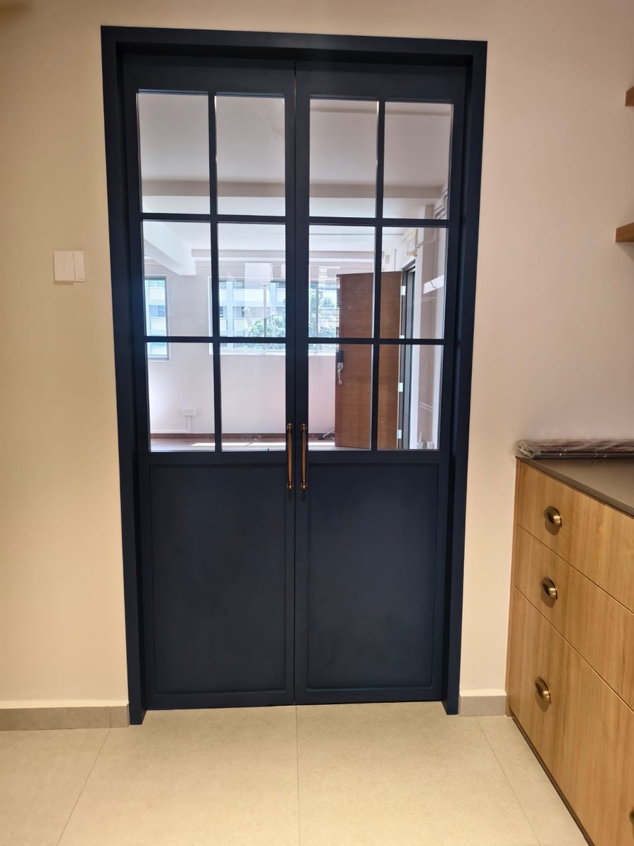 Black crittall-style glass doors, installed by Door Empire Singapore