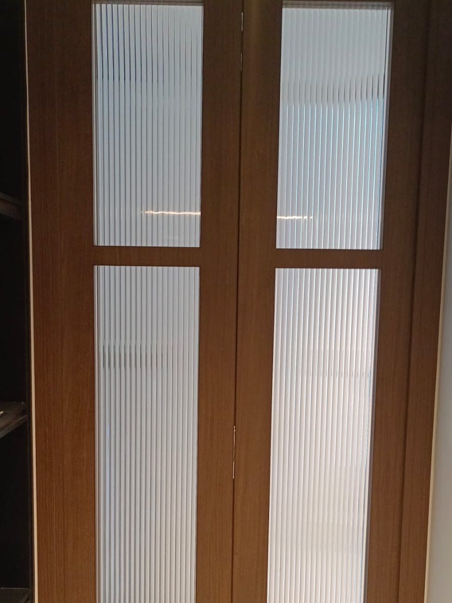 Fluted glass timber bedroom door, installed by Door Empire Singapore