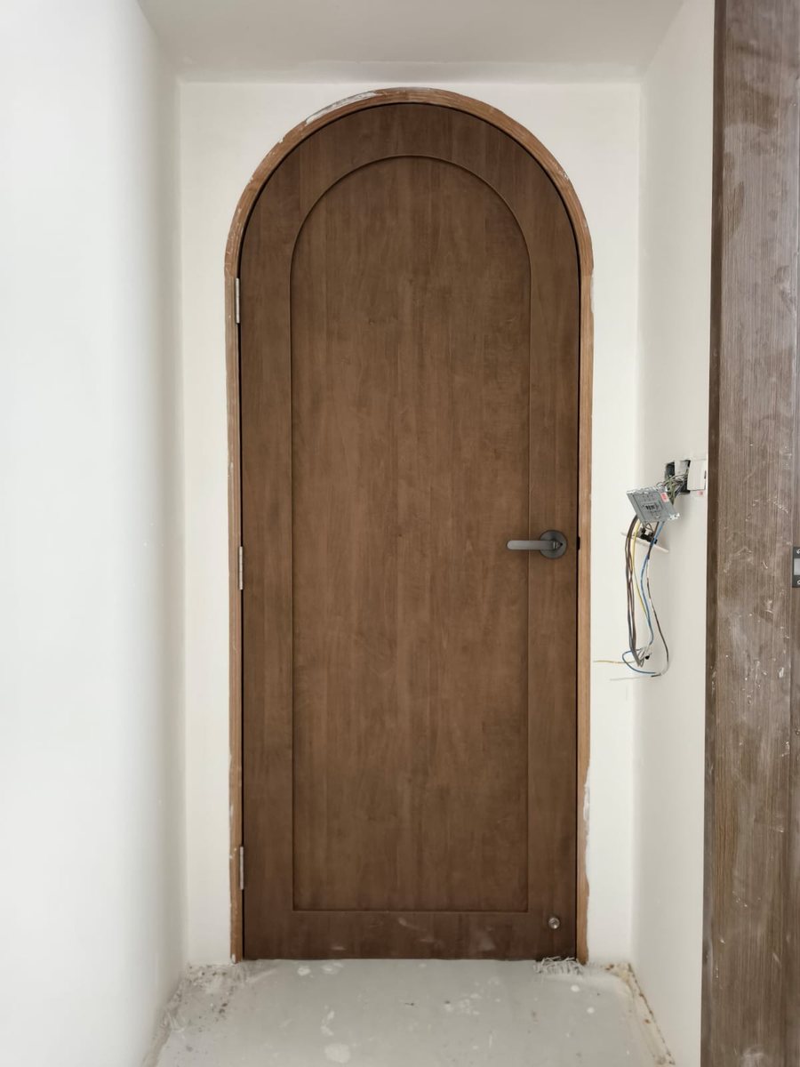 Arched timber bedroom door, installed by Door Empire Singapore
