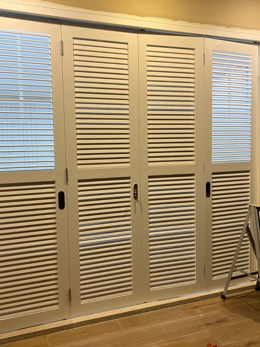 Louvred wardrobe doors, installed by Door Empire Singapore