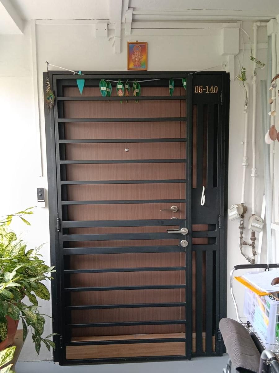 Wood-tone privacy gate, installed by Door Empire Singapore