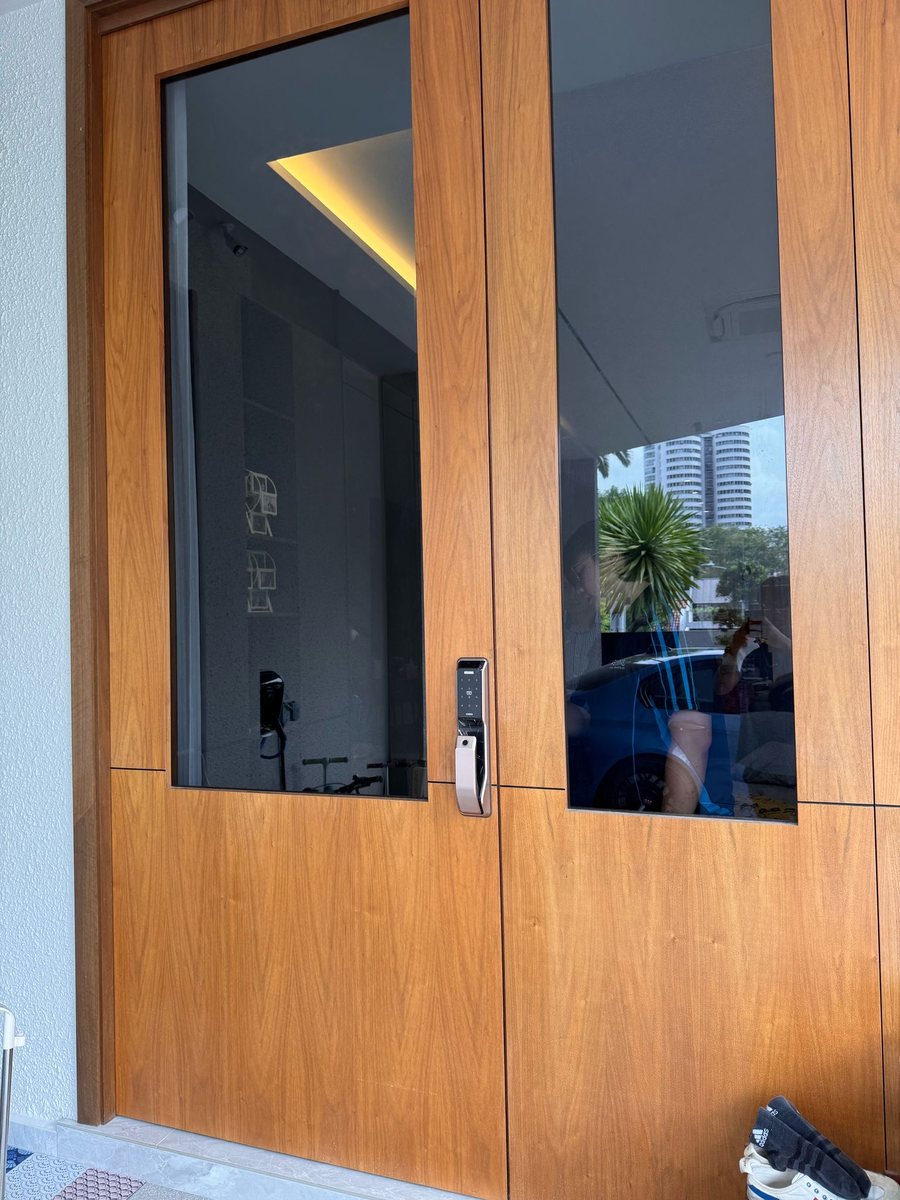 Timber main door with glass panel, installed by Door Empire Singapore