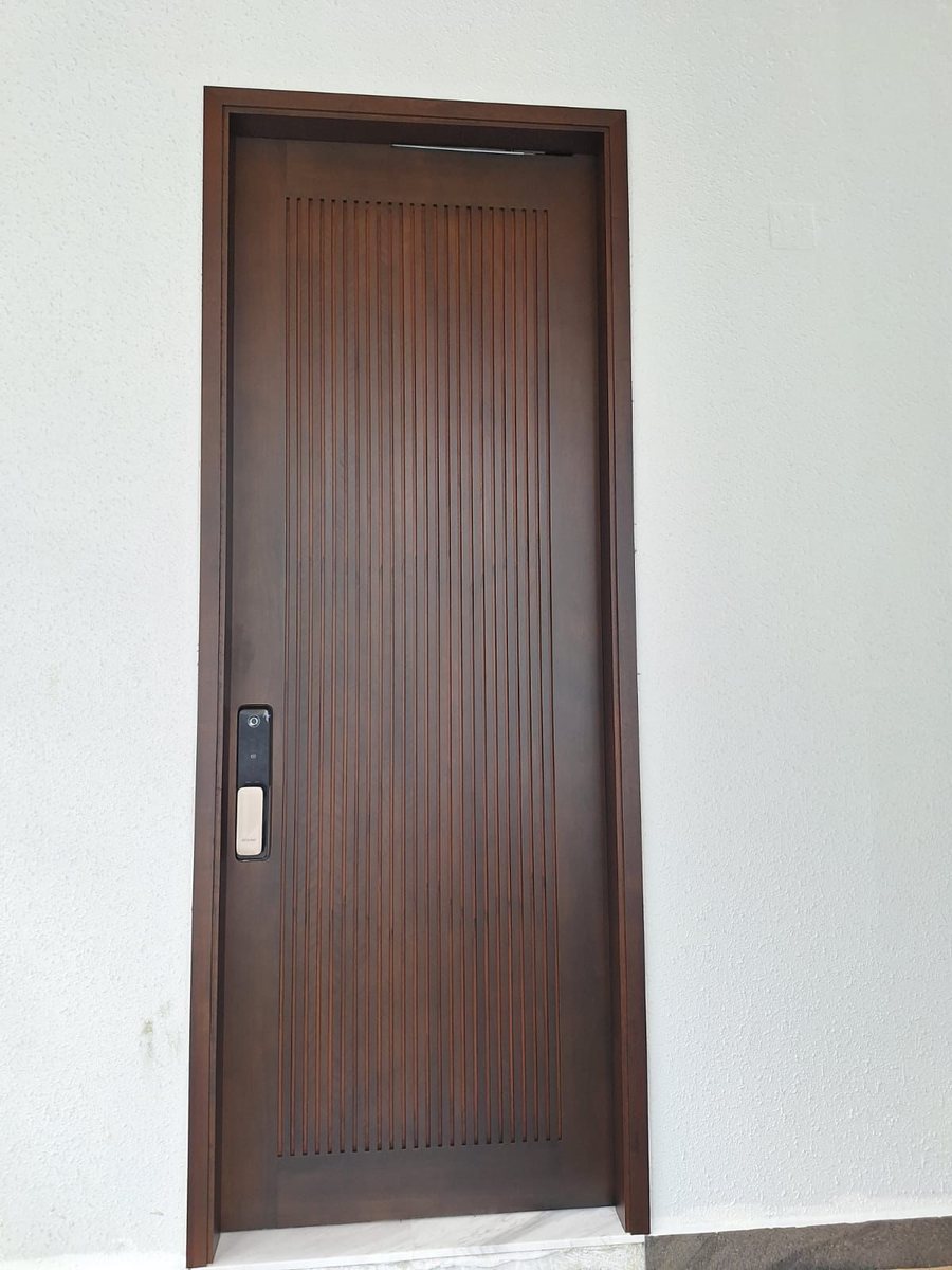 Fluted main door with digital lock, installed by Door Empire Singapore