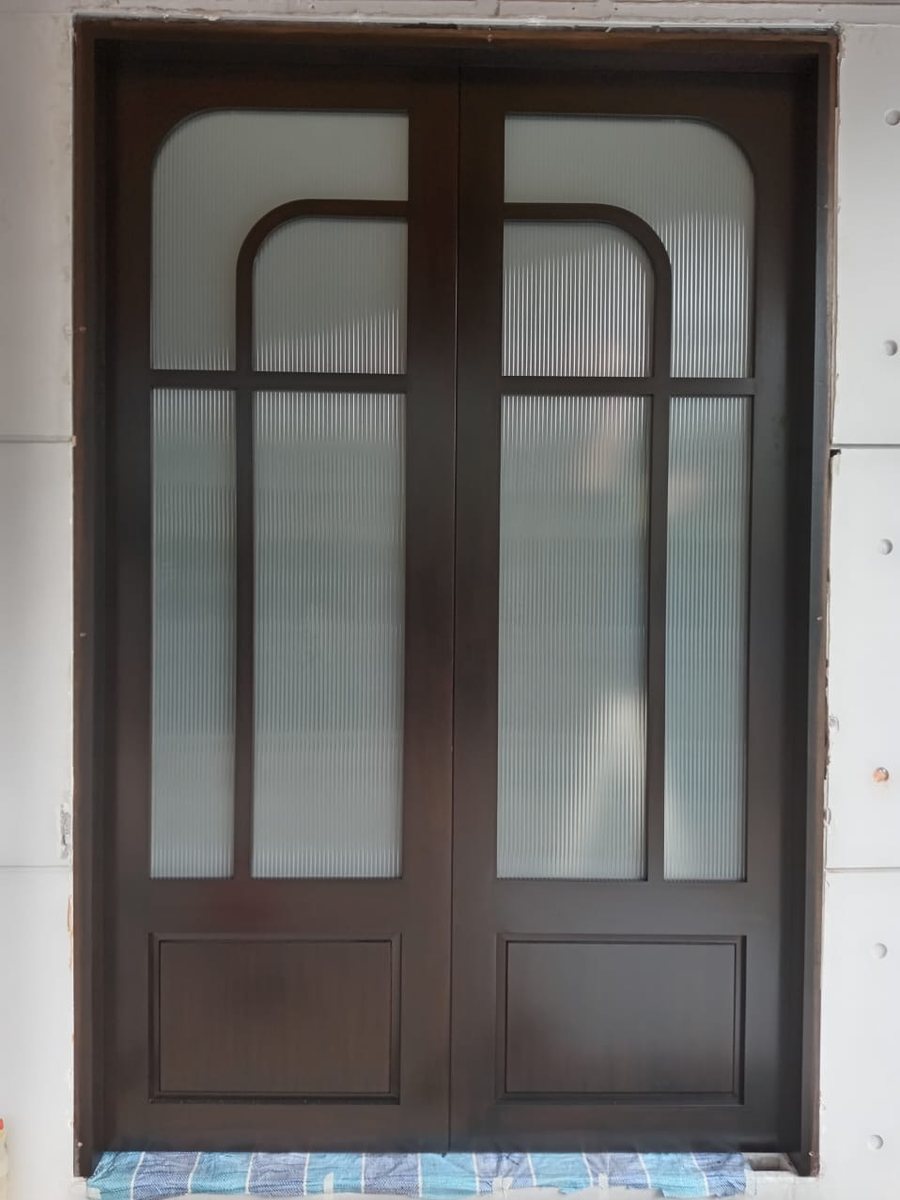 Arched glass timber double door, installed by Door Empire Singapore